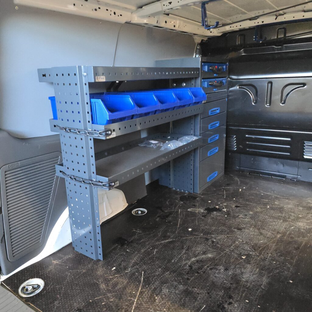Ford Transit Connect van shelving and drawer system installed in cargo area long side