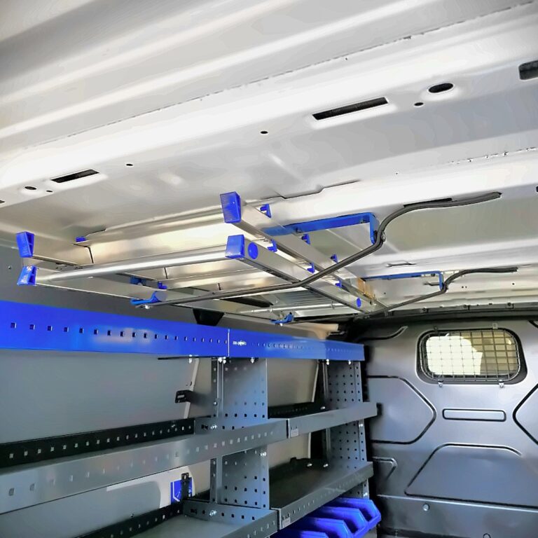 E-Flex ladder holder for a van mounted on the ceiling of a Ford Transit Custom, keeping ladders secure and the cargo floor clear.