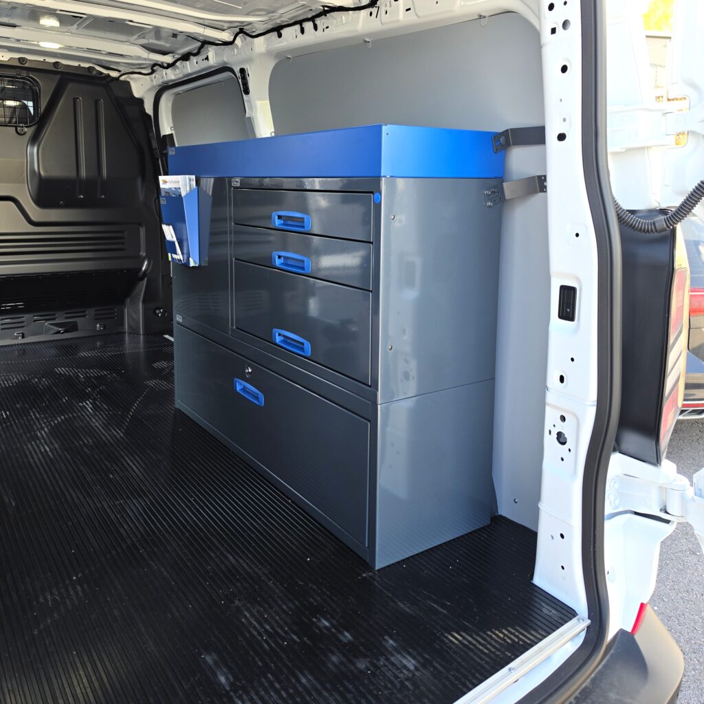 Van racking with end drawers on the short right side wall of a long Ford Transit Custom, 127 cm long, 96 cm high