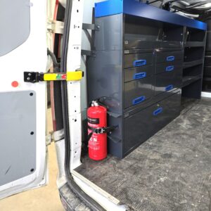 Fire extinguisher holder mounted inside a van cargo area