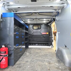 Two ladder racks on roof of Ford Transit Custom van carrying ladders