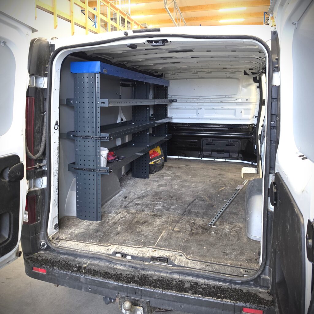 Renault Trafic van with a 230 cm shelving unit installed on the long side wall