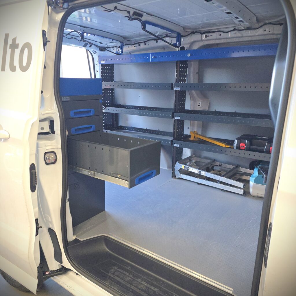 Open drawer in a 100 cm van racking unit installed in a Volkswagen Transporter T7 service van