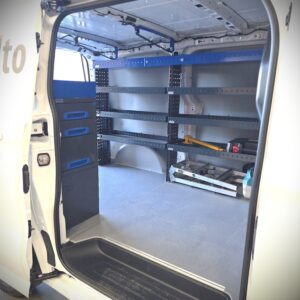 Volkswagen Transporter T7 service van interior viewed from the sliding door with shelving and drawer units