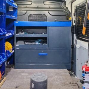 127 cm end-opening van shelving unit with drawers and open shelves installed on the Ford Transit bulkhead