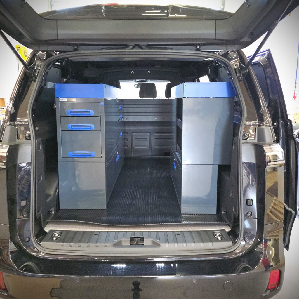 VW ID. Buzz van with 152 cm racking unit including end drawers, height 96 cm, installed in cargo space.