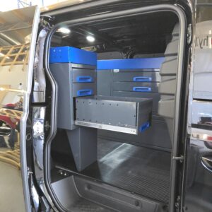 VW ID. Buzz van with 100 cm racking unit, end drawers, shelves, and slim lower unit height 96 cm installed in cargo area.