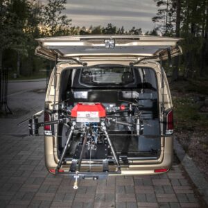 Large drone mounted on pull-out loading platform in Mercedes-Benz Vito van for safe equipment access