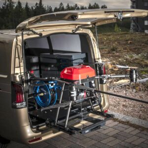 Large drone mounted on pull-out loading platform in Mercedes-Benz Vito van for safe equipment access