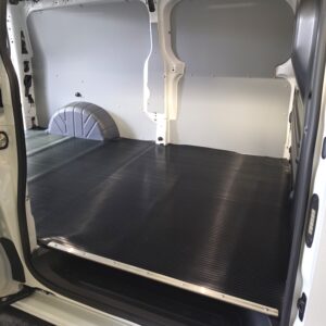 Custom-cut Urakumi rubber floor mat fitted in a Ford Transit Custom cargo area