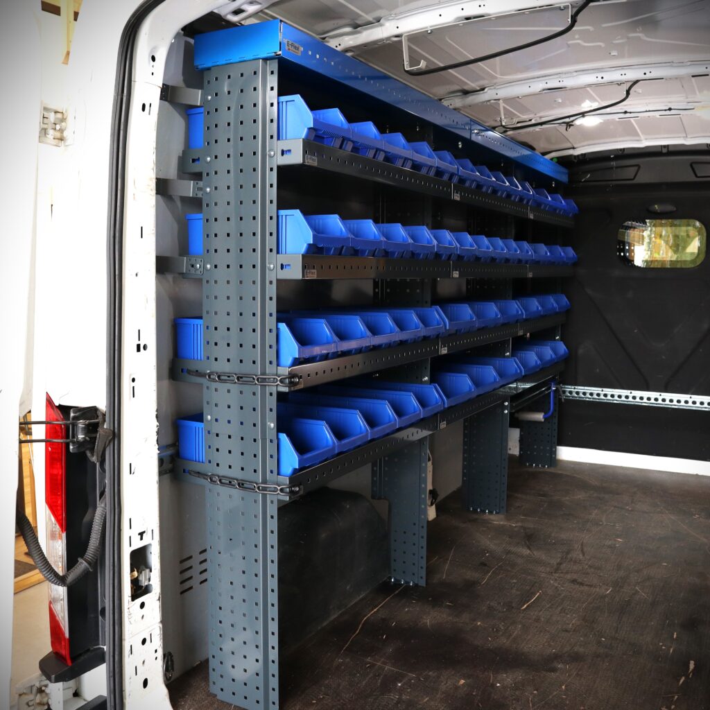 300 cm Ford Transit van shelving system with long open shelves installed inside a large cargo van