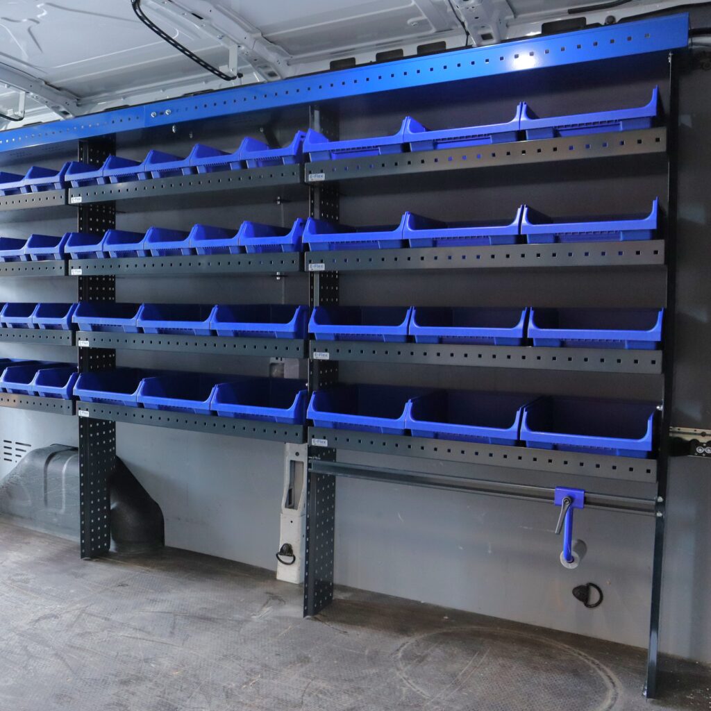 300 cm Ford Transit van shelving system with long open shelves installed inside a large cargo van