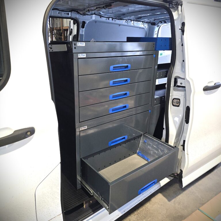 Ford Transit Custom 76 cm drawer tower with top shelf accessible from the driver side sliding door in a double sliding door van