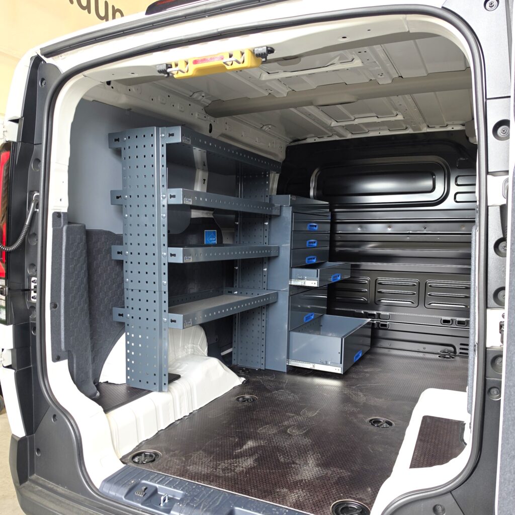 Van shelves and drawers installed in a Kia PV5