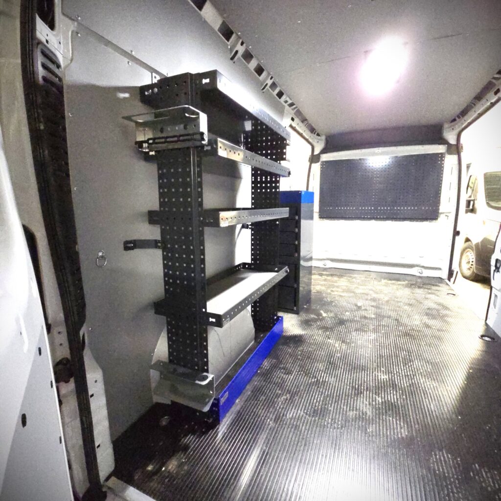 Shovel and pry bar holder mounted inside Toyota Proace Max van