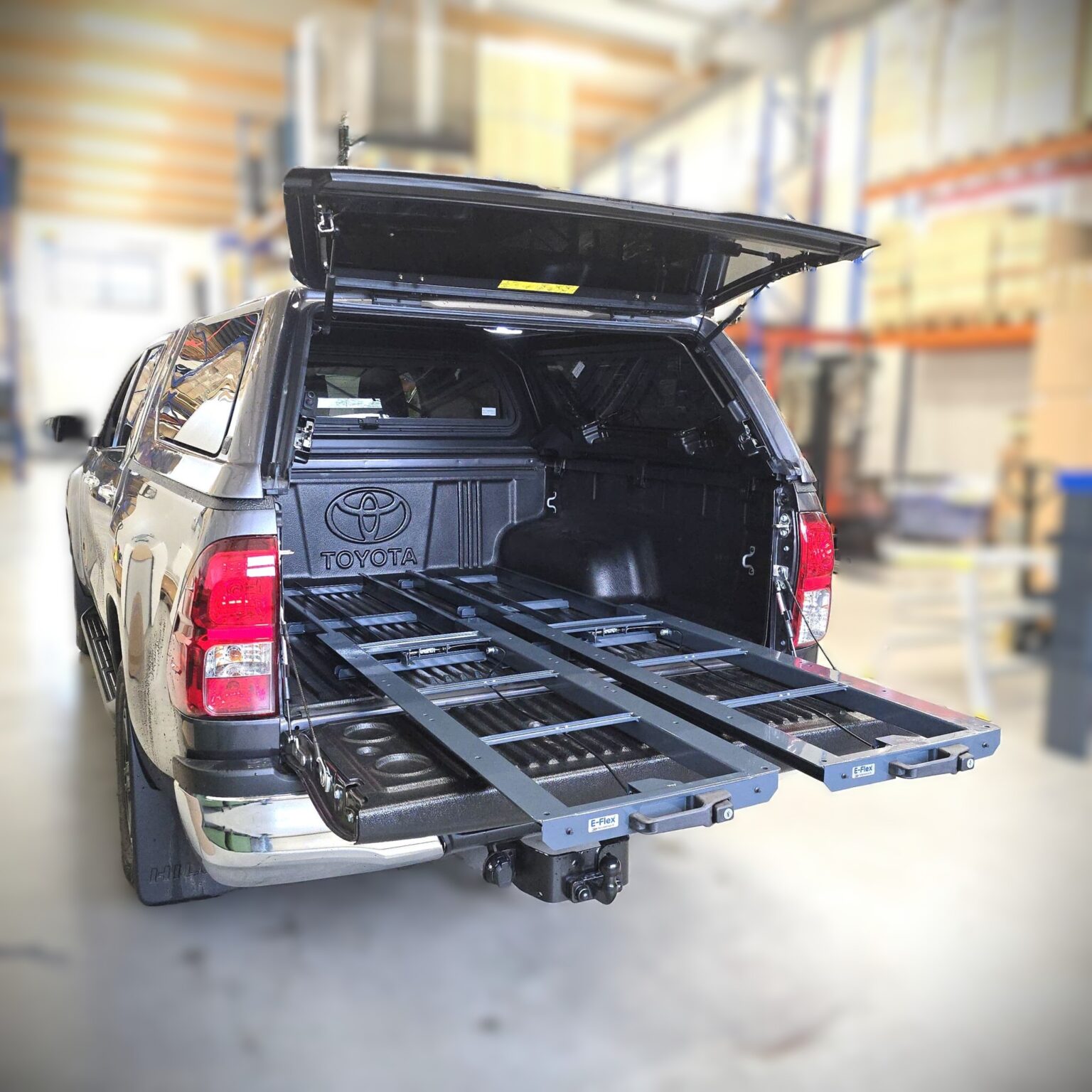 Toyota Hilux pull-out loading platform heavy duty van storage solution